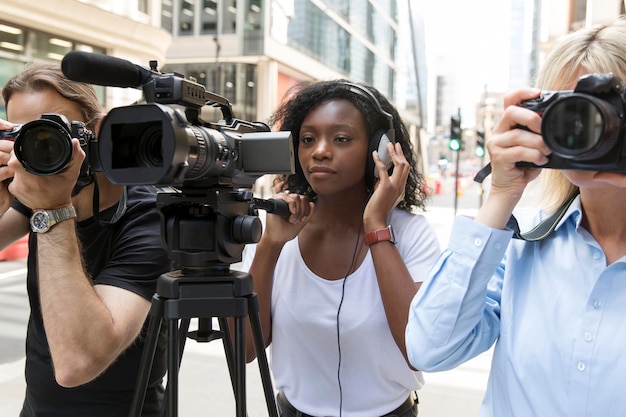 Close up on camera crew filming an interview