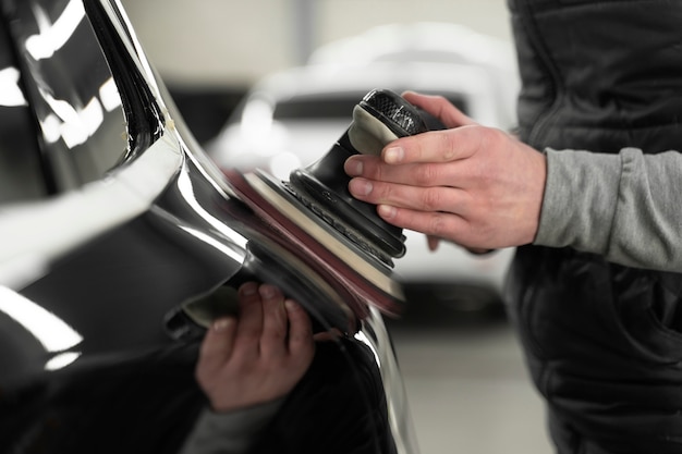 Close up on car care process