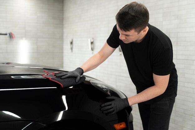 Close up on car care process