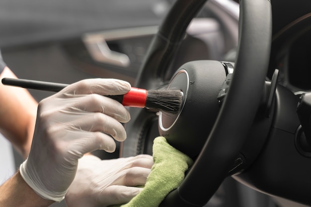 Close up on car care process