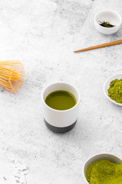 Free photo close-up ceramic bowl with matcha tea