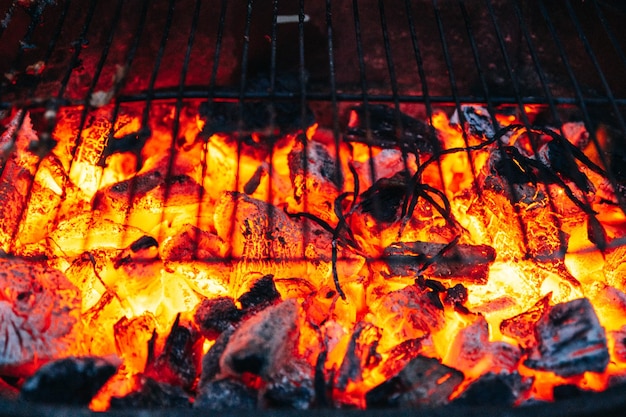 Free Photo close up of charcoal barbecue burning