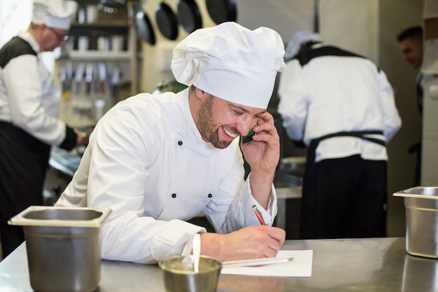 Free photo close up on chef cooking in restaurant kitchen