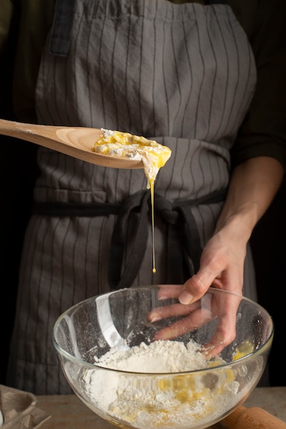 Close up chef preparing dough