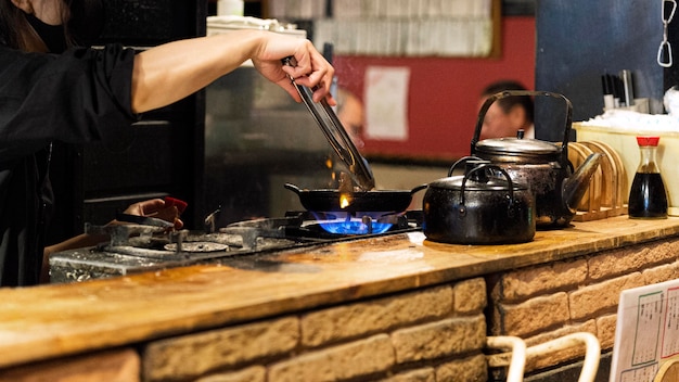 Close-up chef preparing traditional japanese food