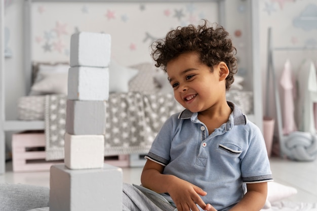 Close up on child enjoying didactic game