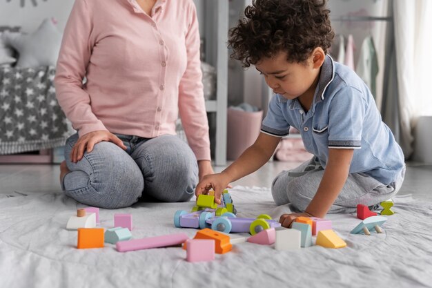 Close up on child enjoying didactic game