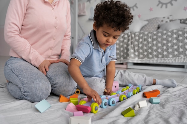 Close up on child enjoying didactic game