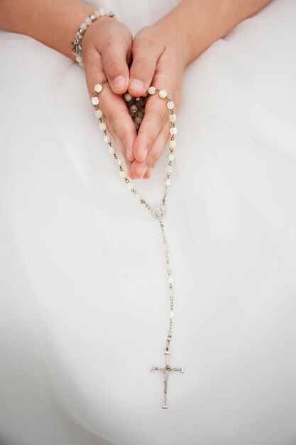 Close up on child hands  during holy communion