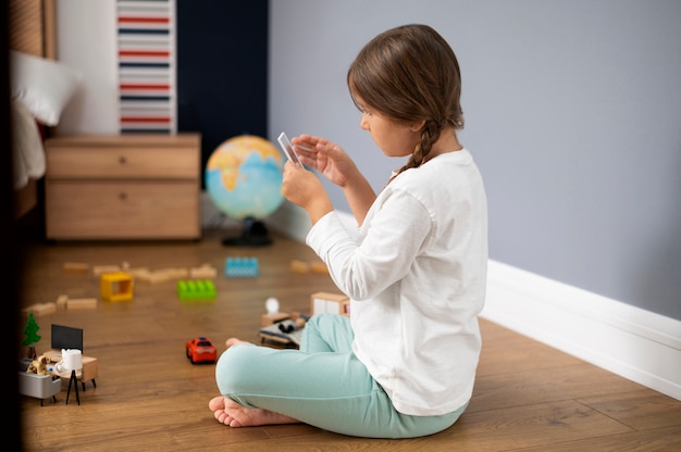 Free Photo close up on child playing in her room