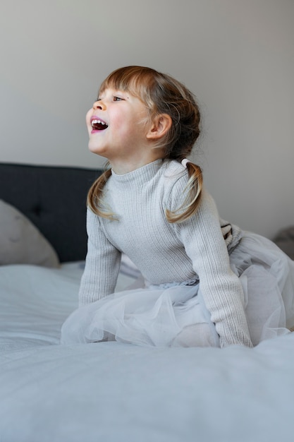 Free photo close up on child playing in her room