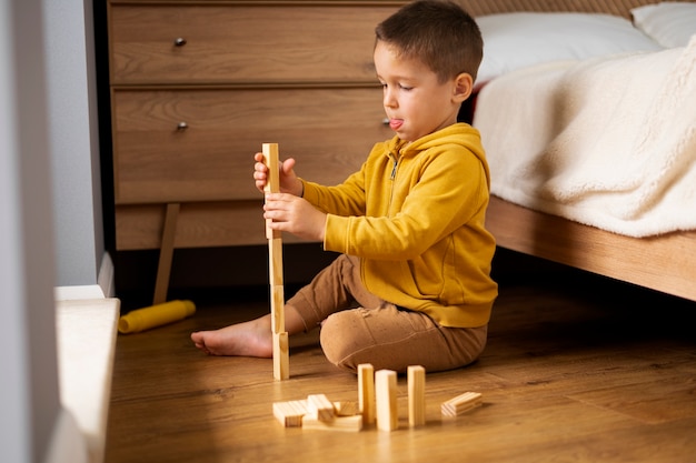 Free photo close up on child playing in his room