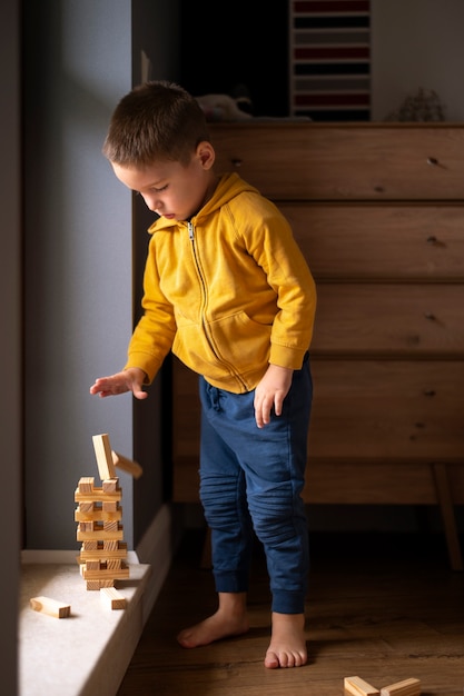 Free photo close up on child playing in his room