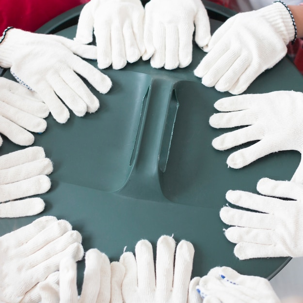 Free Photo close-up children's hands with surgical gloves