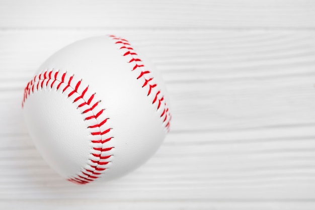 Close-up of clean baseball on wooden background