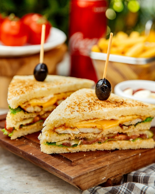 Free Photo close up of club sandwich cut in half