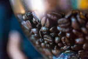 Free photo close-up coffee beans in jar