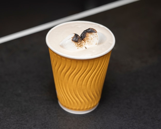 Free photo close-up coffee cup with milk and spices