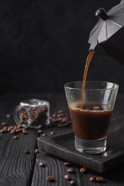 Close-up of coffee poured into glass