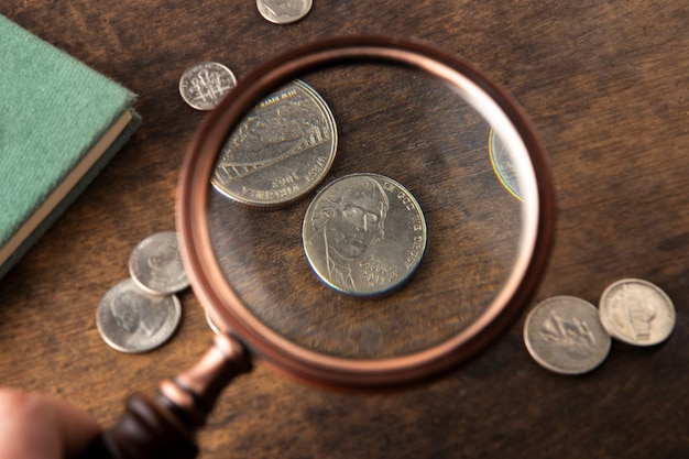 Free Photo close up on coins on table