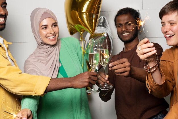 Close up colleagues partying with balloon