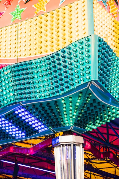 Free Photo close-up of colorful carousel light bulbs