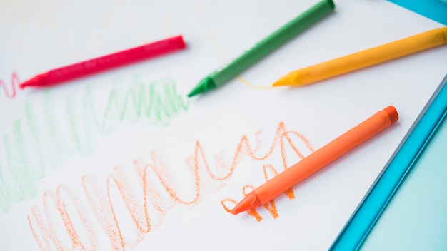 Free photo close-up of colorful crayon on white paper