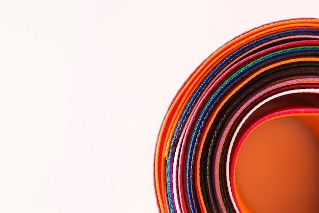 Free Photo close-up of colorful curved ribbons on white background