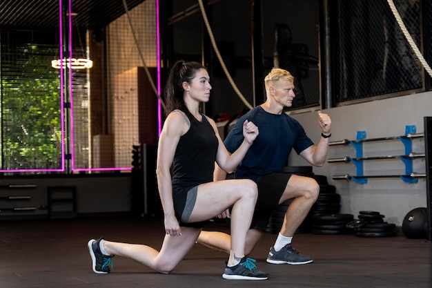 Close up on couple doing crossfit workout