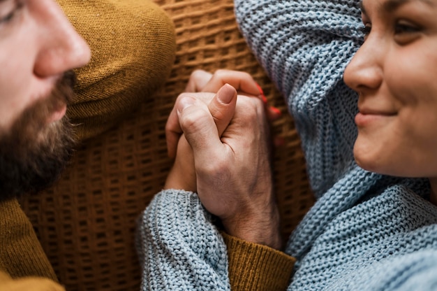 Close-up couple holding hands