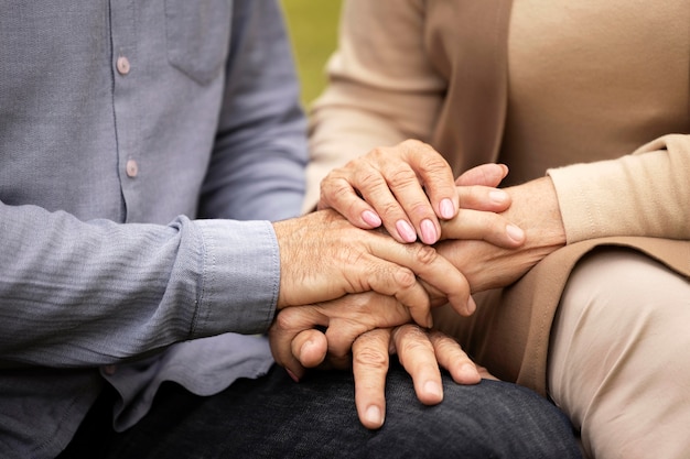 Free Photo close up couple holding hands