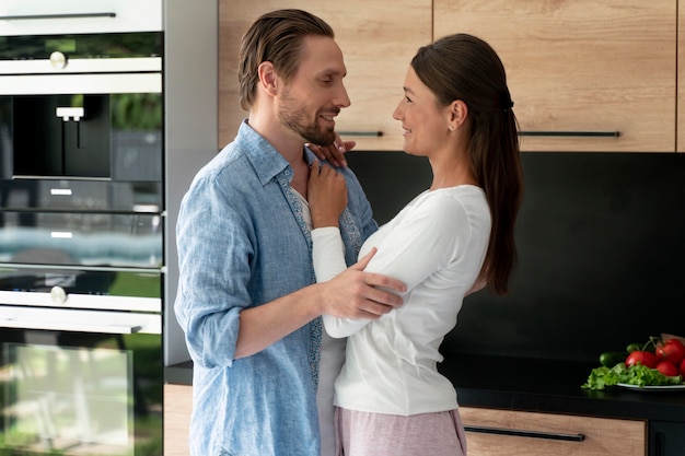 Close up on couple at home sharing tender moments