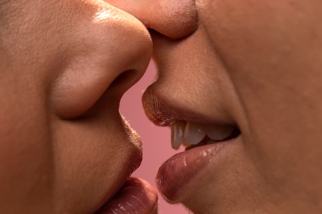 Free photo close up couple in love kissing