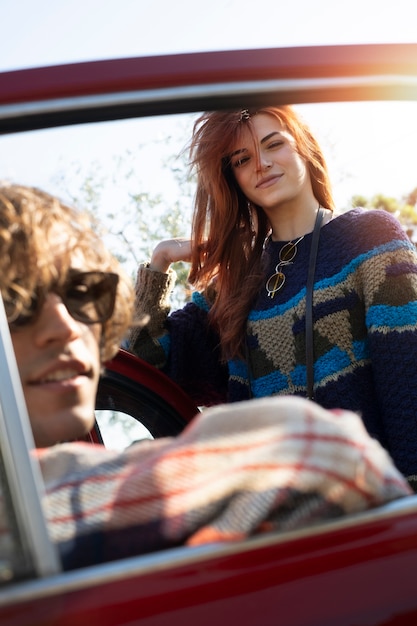 Close up couple with car