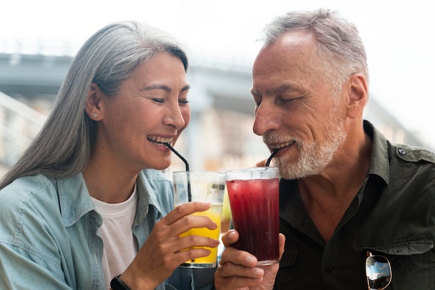 Close up couple with drinks