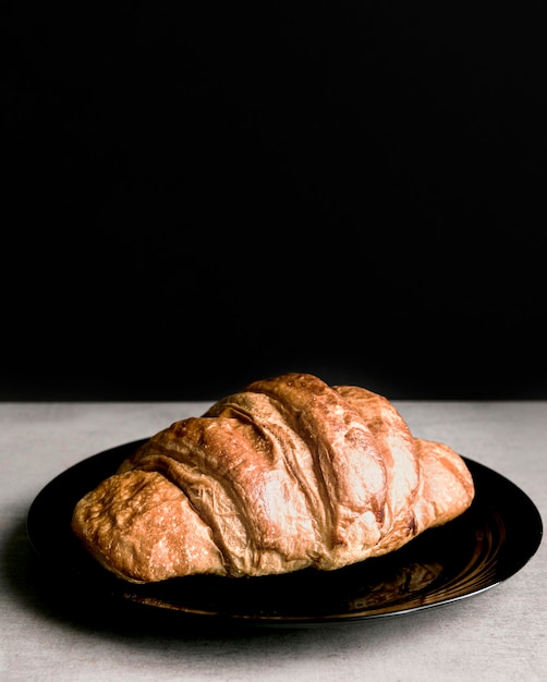 Close-up croissant on plate