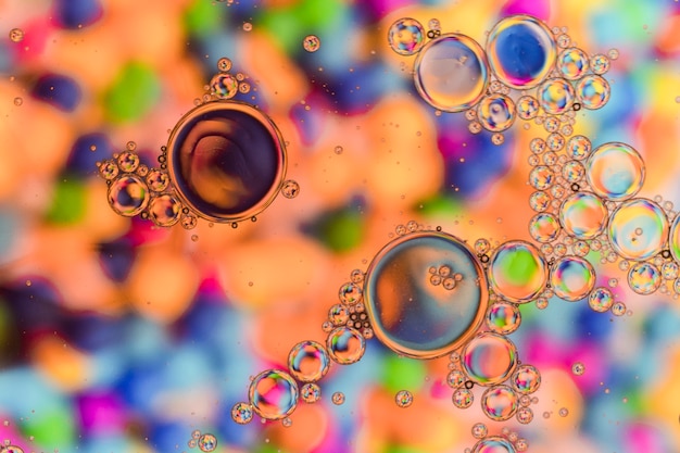 Free Photo close up crystalline bubbles with hued background