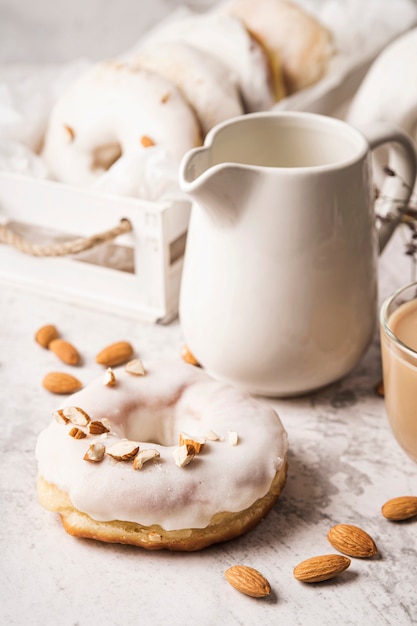 Close-up cup of coffee with donut