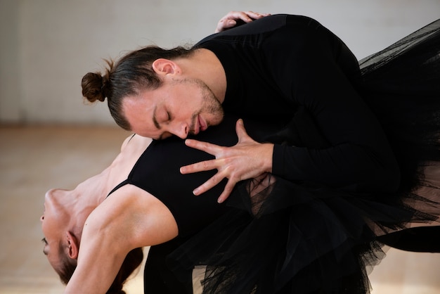 Free photo close up dancers performing together