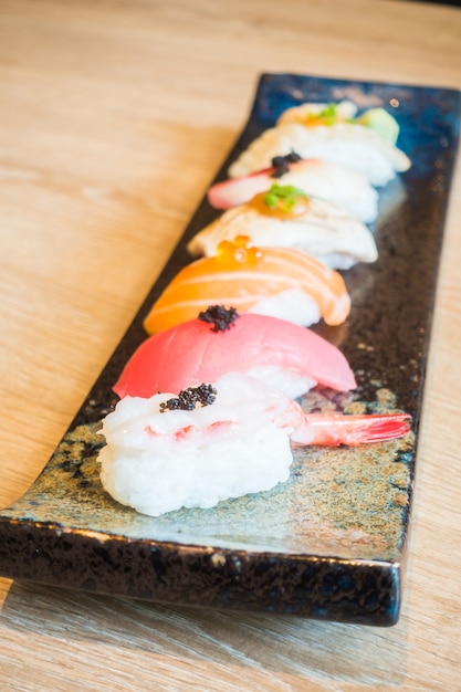 Close-up of dark tray with sushi