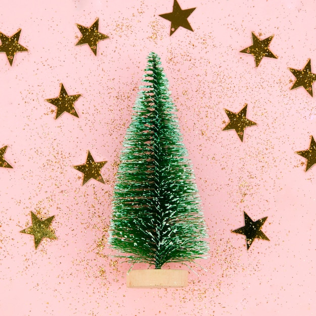 Free photo close-up decoration tree with golden stars