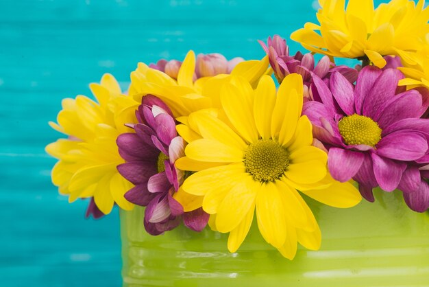 Close-up of decorative yellow and purple flowers