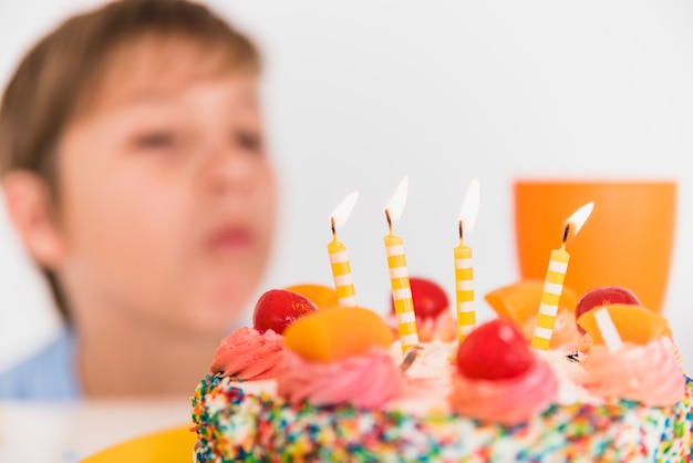 Free Photo close-up of a delicious birthday cake with burning candles