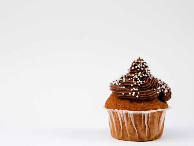 Close-up delicious muffin on white background