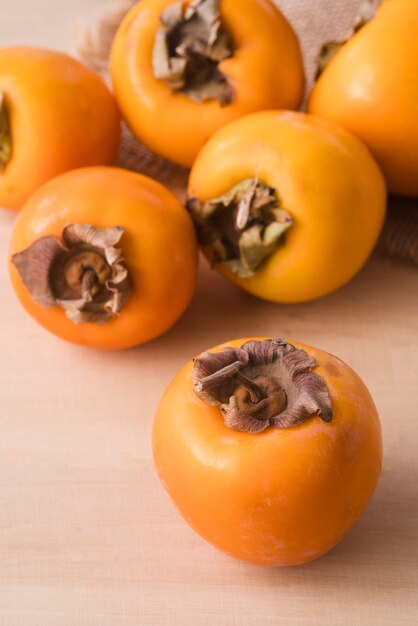 Close-up delicious persimmons on the table