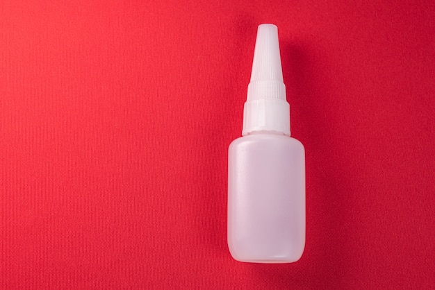 Free photo close up details of a glue bottle isolated