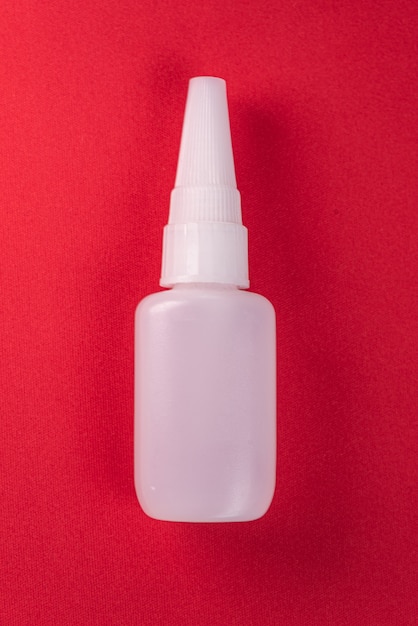 Free photo close up details of a glue bottle isolated