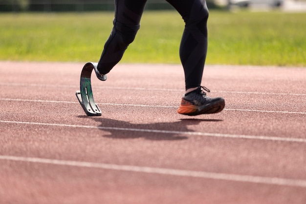 Close up disabled athlete running