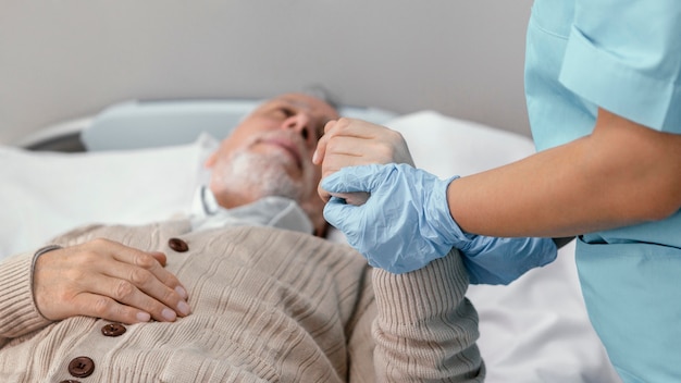 Close up doctor checking patient