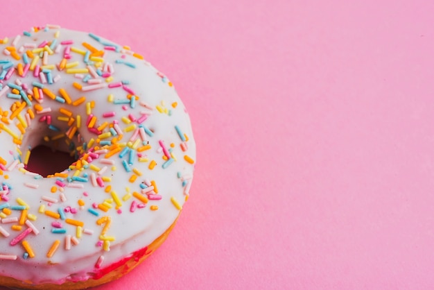 Close-up of donut on pink background